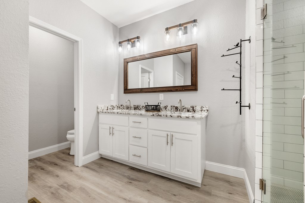 308 Mystic Ridge Blairsville, GA 30512 - Photo 38 of 68 a bathroom with a granite countertop sink mirror and double