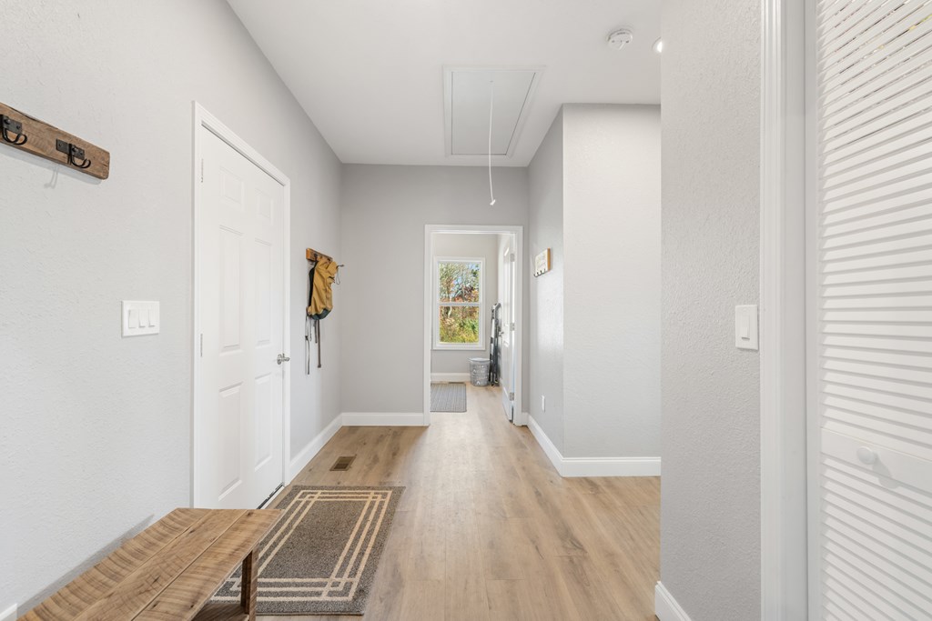 308 Mystic Ridge Blairsville, GA 30512 - Photo 39 of 68 a bedroom with a bed and wooden floor