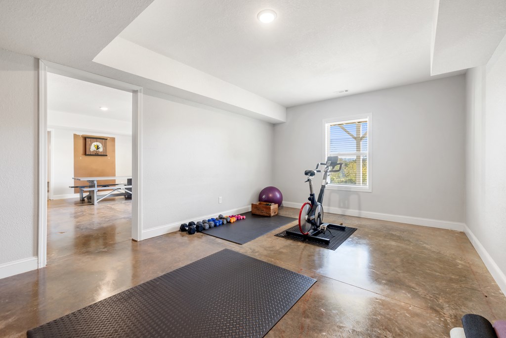 308 Mystic Ridge Blairsville, GA 30512 - Photo 65 of 68 a room with gym equipment and a window