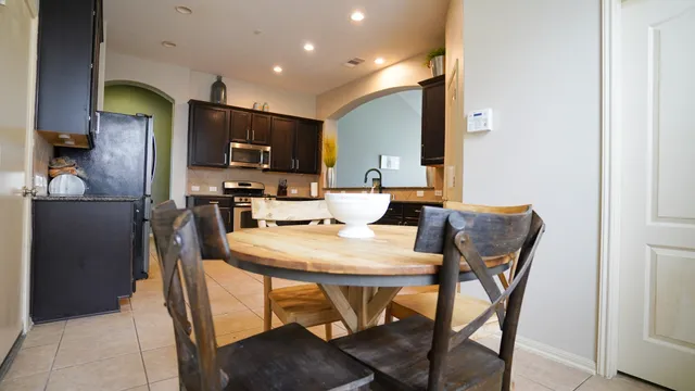 a view of a dining room with furniture