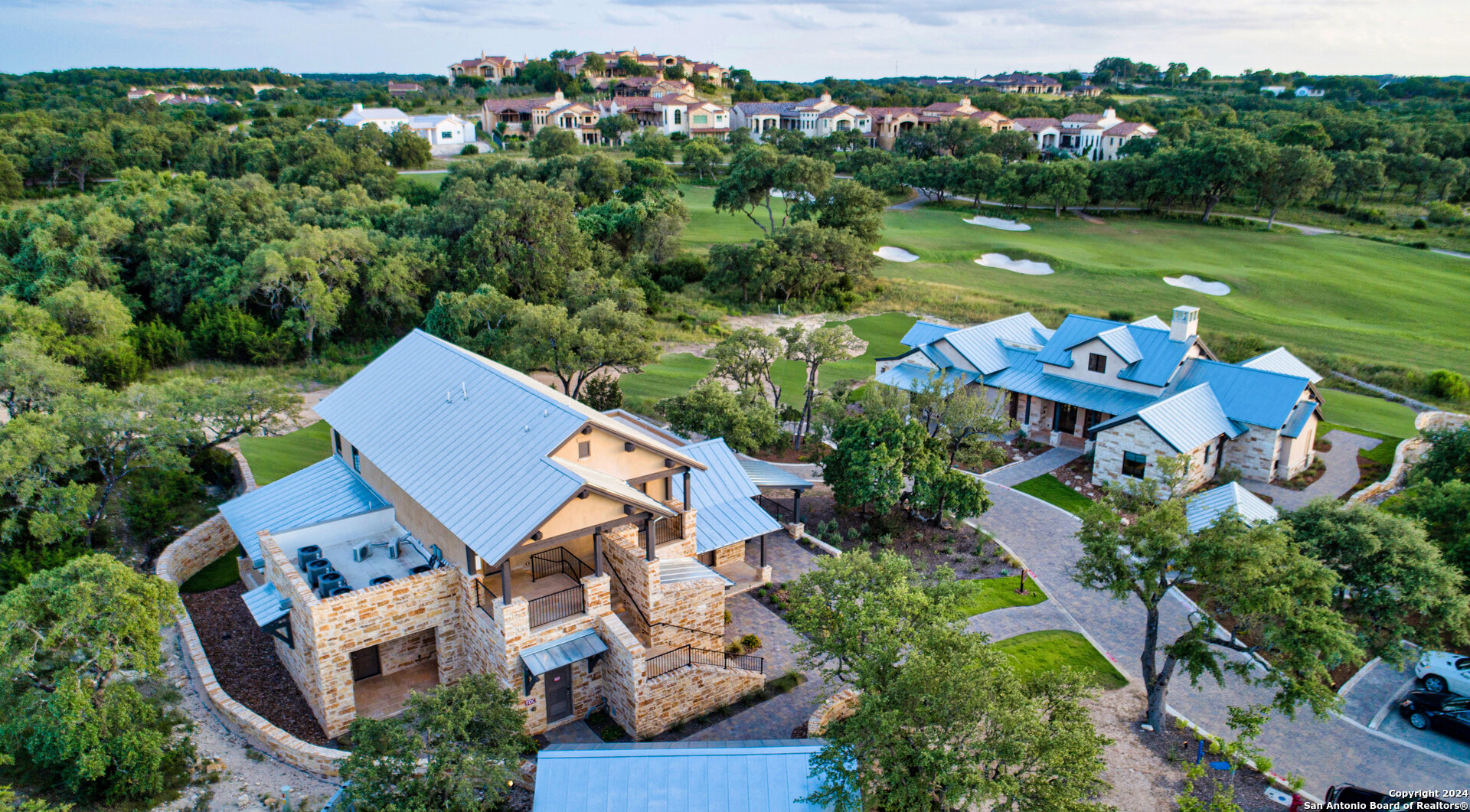 Lot 7 Panther Bend Boerne, TX 78006 - Photo 4 of 20 an aerial view of a house with swimming pool a yard and a large pool