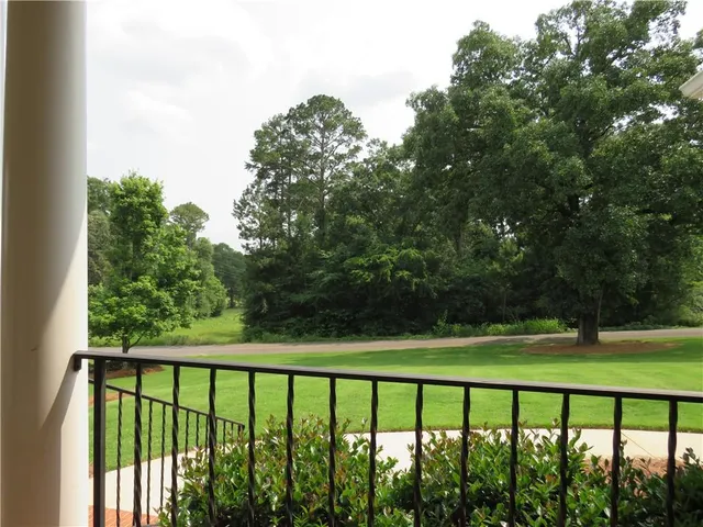 a view of outdoor space with deck and yard