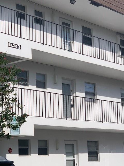 a balcony view with a balcony