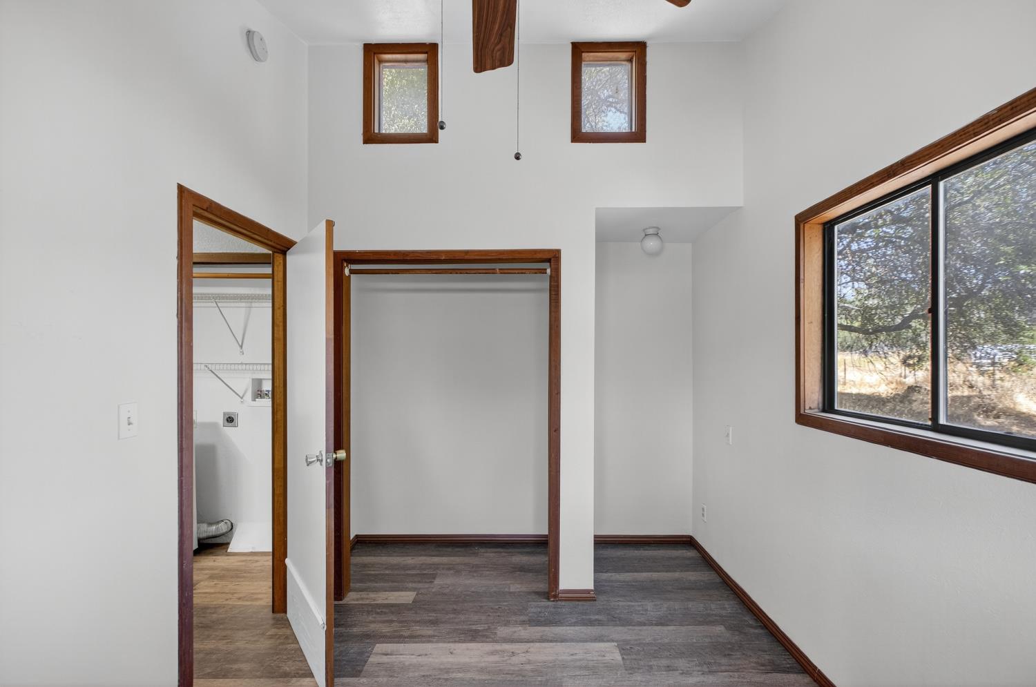36 Crystal Pines Road Oroville, CA 95965 - Photo 14 of 26 a view of an empty room with wooden floor and a window