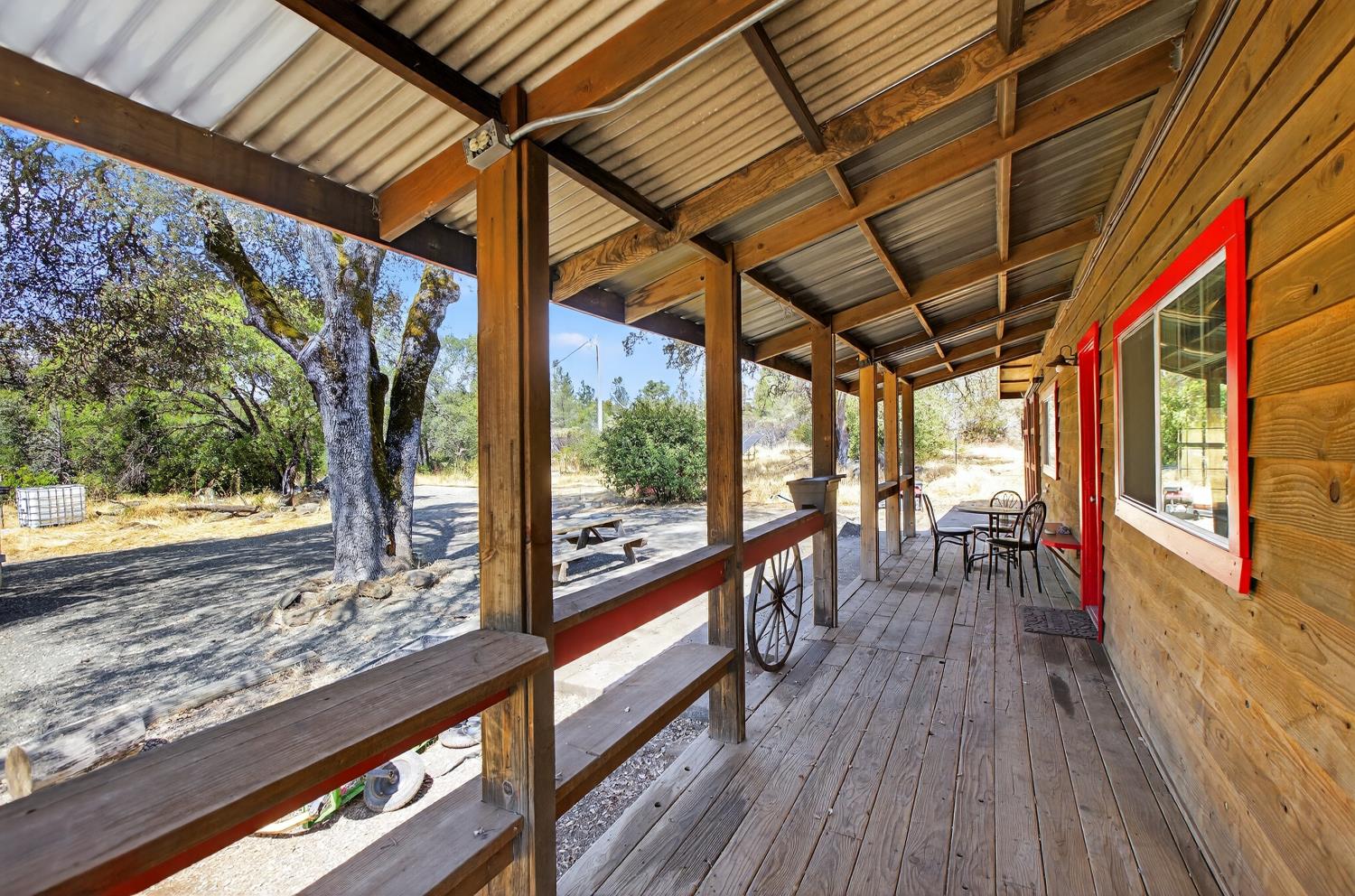 36 Crystal Pines Road Oroville, CA 95965 - Photo 16 of 26 a view of a porch with wooden floor