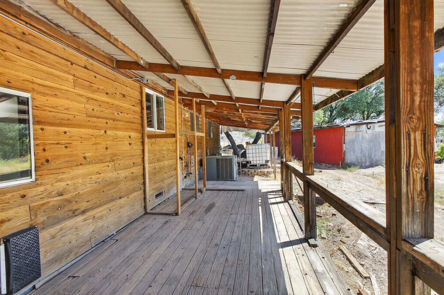 36 Crystal Pines Road Oroville, CA 95965 - Photo 17 of 26 a view of a balcony with wooden floor