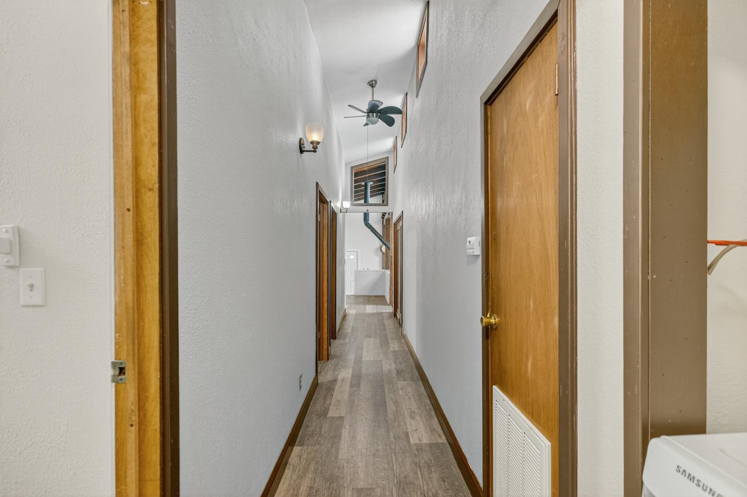 36 Crystal Pines Road Oroville, CA 95965 - Photo 18 of 26 a view of a hallway with wooden floor and staircase