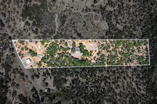 a black and white photo of a house