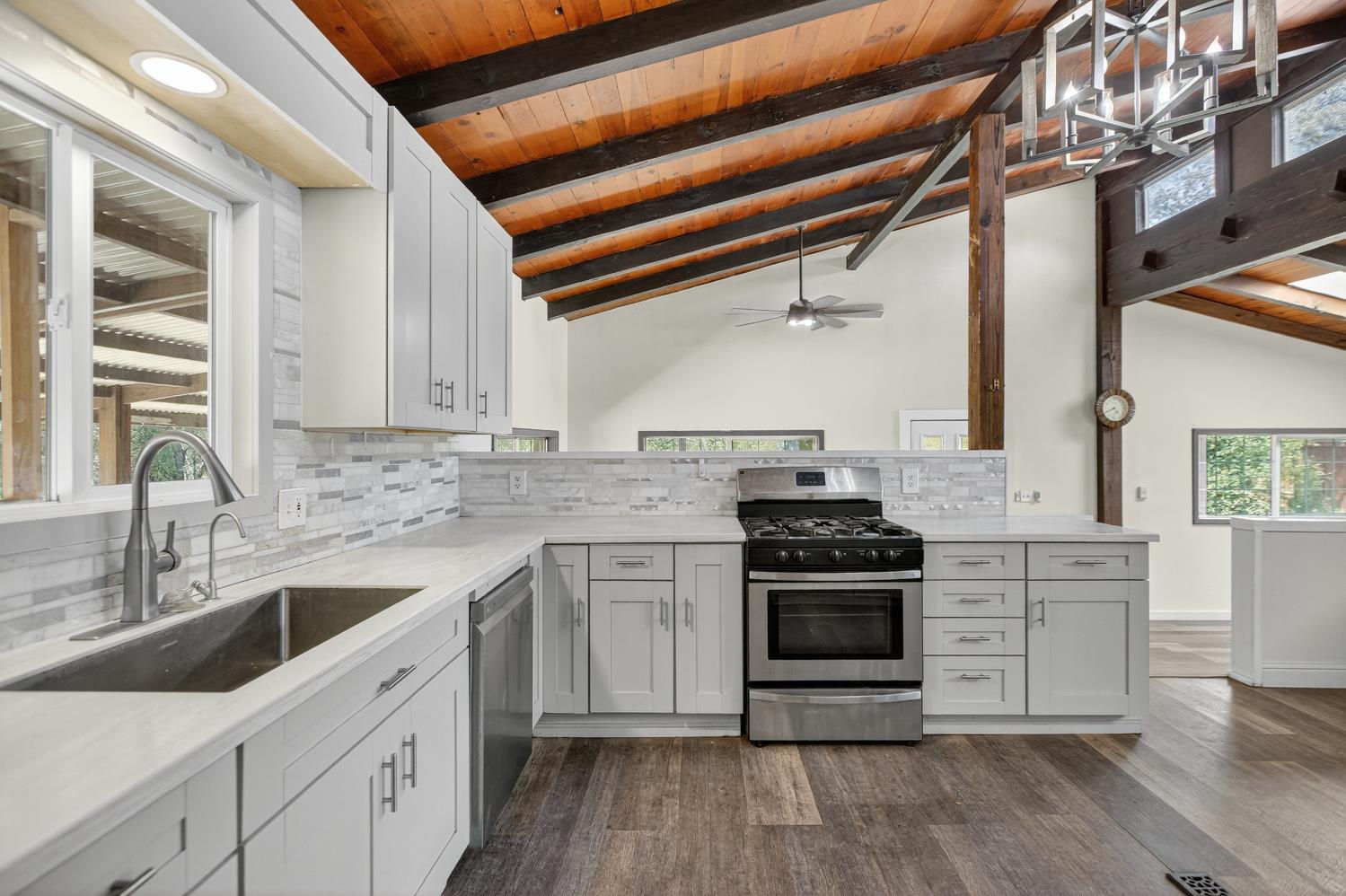 36 Crystal Pines Road Oroville, CA 95965 - Photo 4 of 26 a kitchen with a stove and a sink