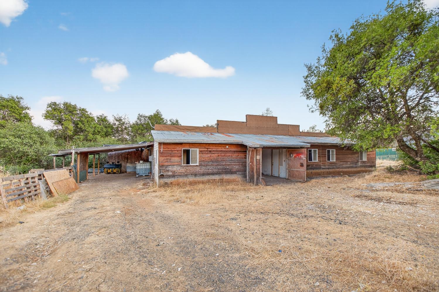 36 Crystal Pines Road Oroville, CA 95965 - Photo 10 of 26 a view of a house with a yard and roof