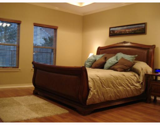 115 Pine Valley Drive Portland, TX 78374 - Photo 9 of 10 a bedroom with a bed and window