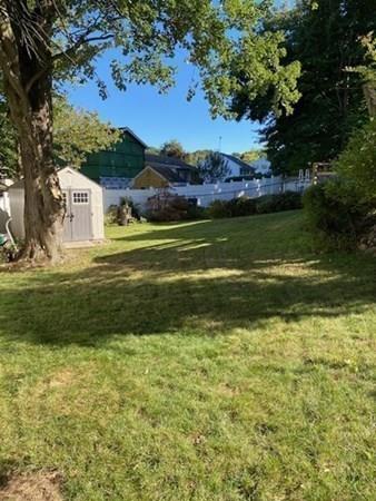 599 Union Street Braintree, MA 02184 - Photo 16 of 17 a view of a house with a big yard