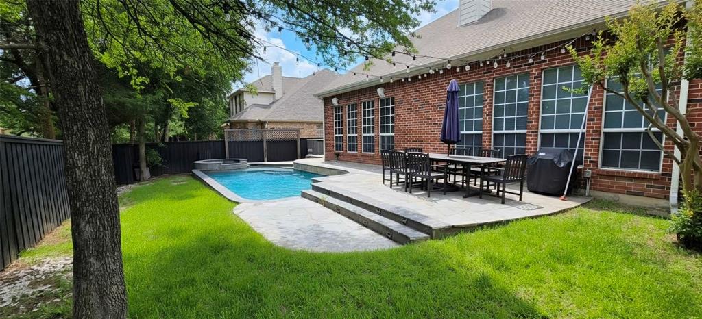 1715 Ranger Drive Keller, TX 76248 - Photo 20 of 20 a view of a house with backyard porch and sitting area