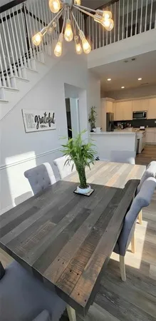 a view of a living room and kitchen