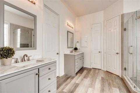1715 Ranger Drive Keller, TX 76248 - Photo 10 of 20 a spacious bathroom with a double vanity sink mirror and