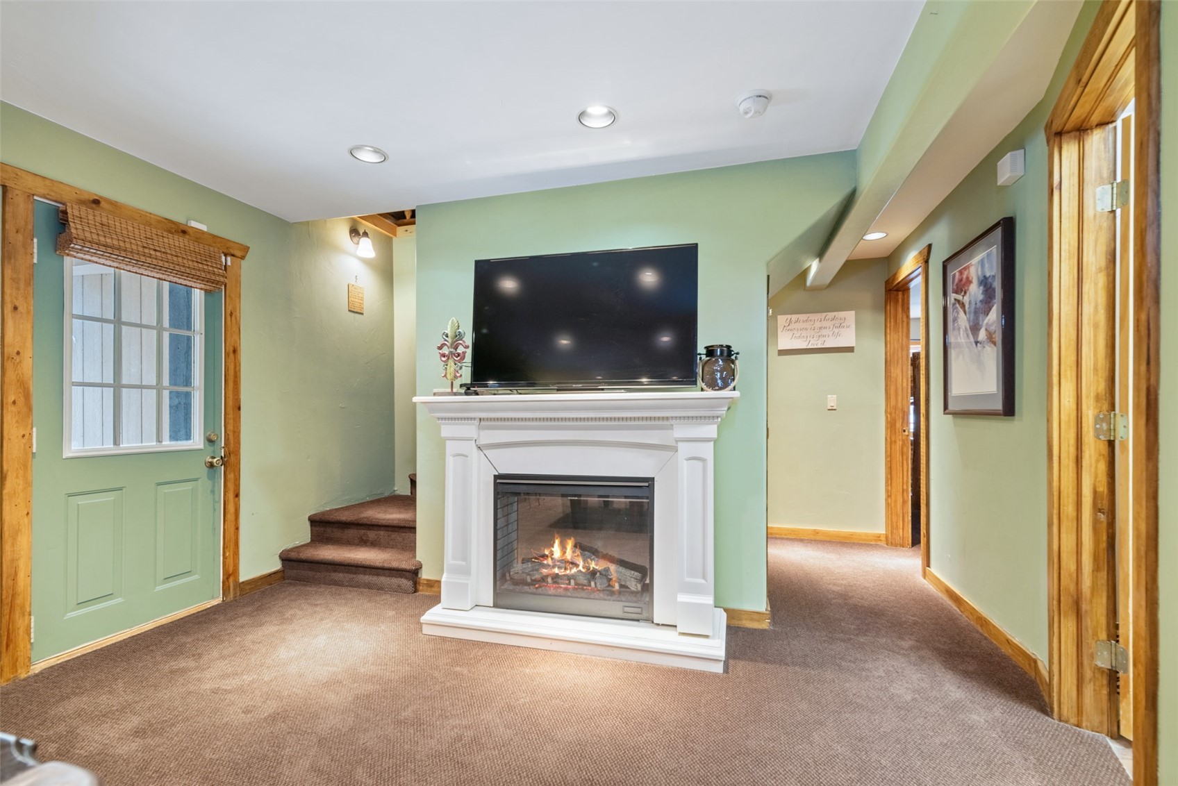 243 Rena Road Breckenridge, CO 80424 - Photo 18 of 50 Unfurnished living room with carpet floors