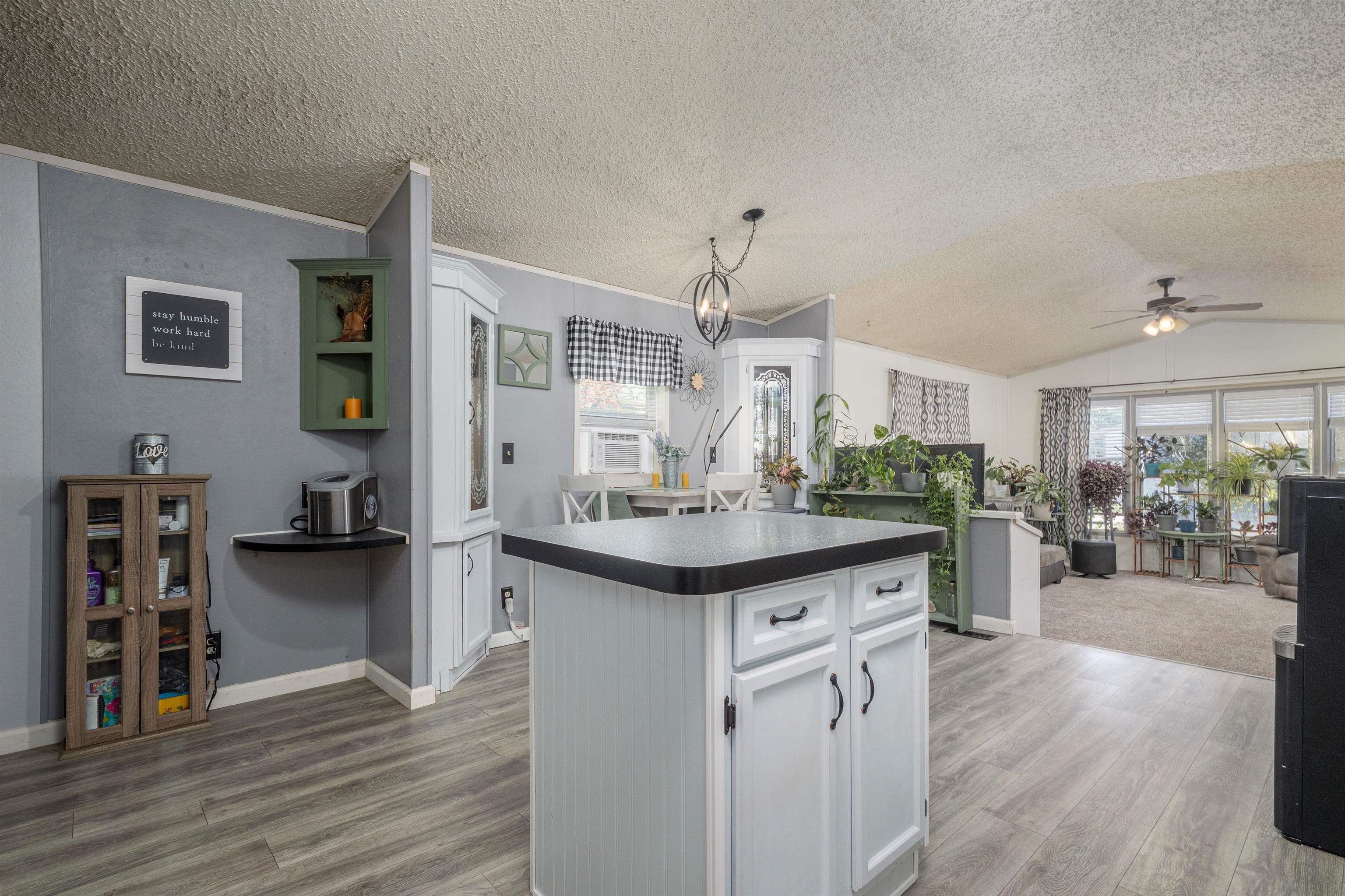 435 32 Road, Unit 705 Clifton, CO 81520 - Photo 12 of 25 a kitchen with stainless steel appliances granite countertop a sink and cabinets