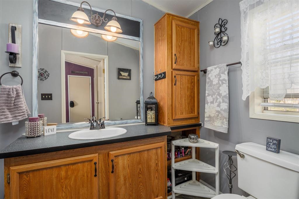 435 32 Road, Unit 705 Clifton, CO 81520 - Photo 22 of 25 a bathroom with a sink double vanity and a mirror