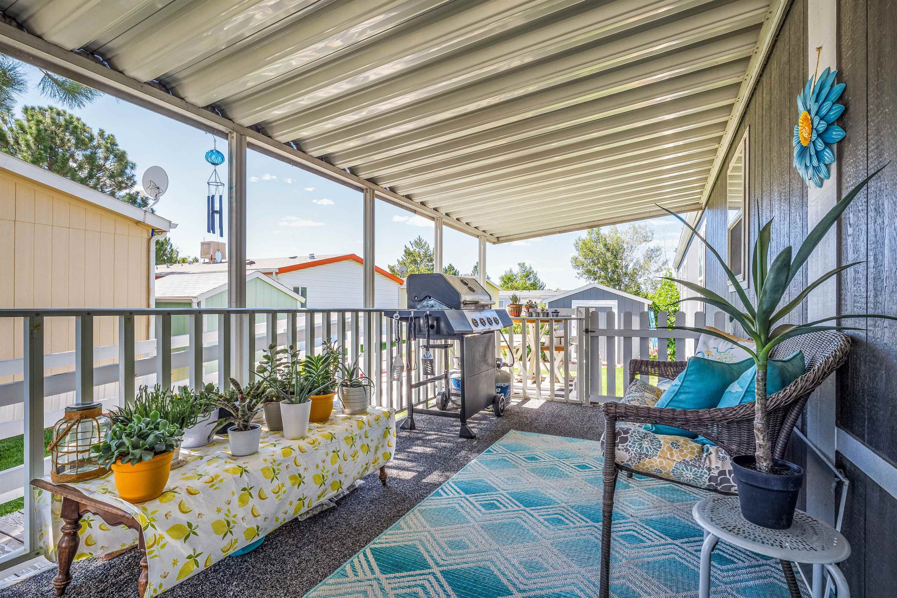 435 32 Road, Unit 705 Clifton, CO 81520 - Photo 4 of 25 a balcony with furniture and potted plants