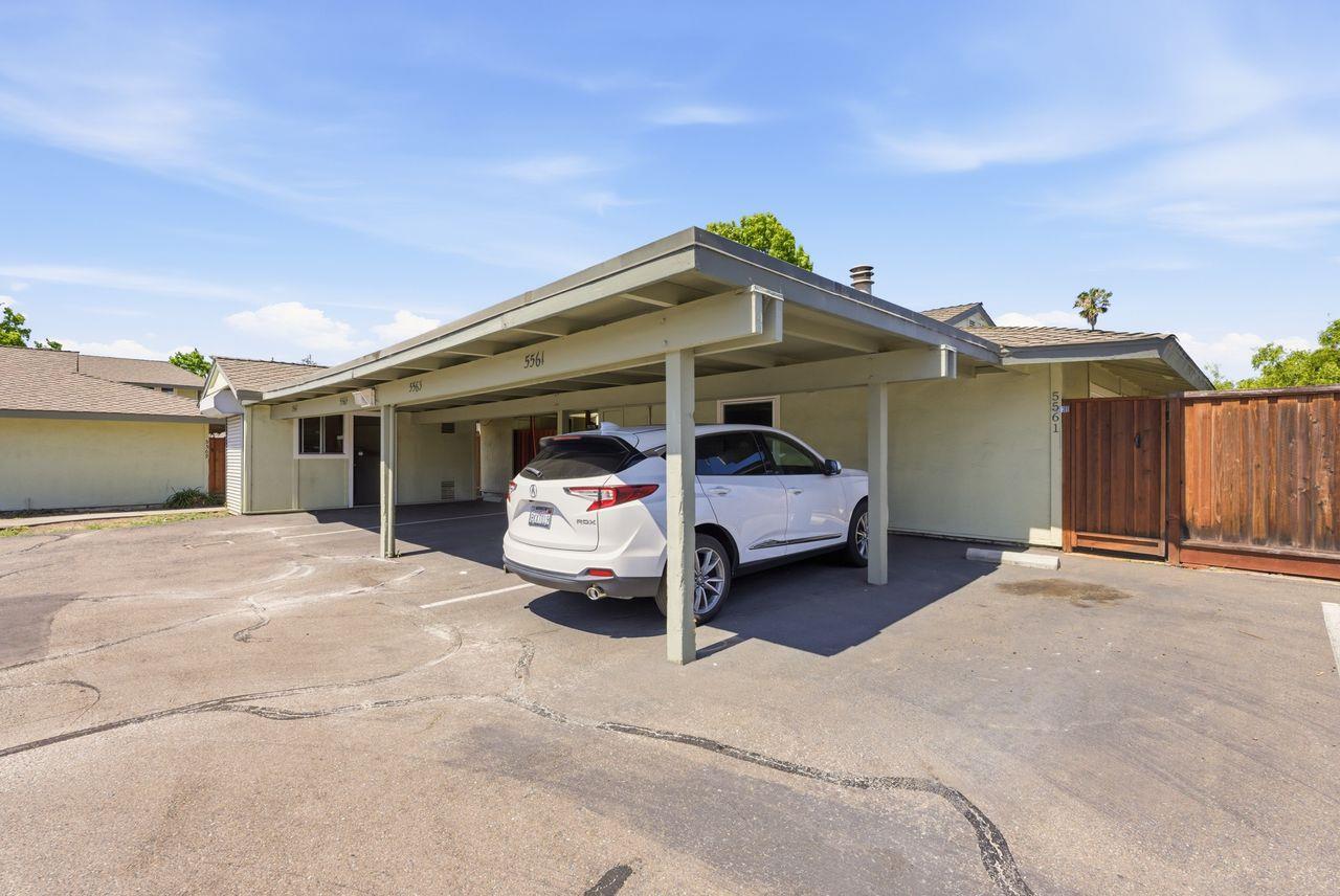 5561 Roundtree Common Fremont, CA 94538 - Photo 20 of 29 a car parked in front of a house