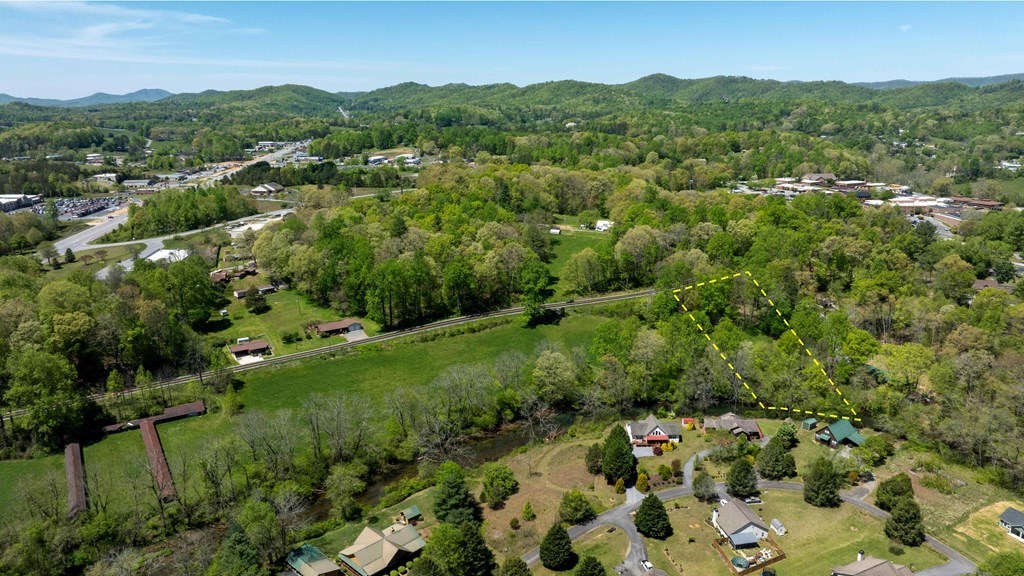 981 Myers Chapel Road Hayesville, NC 28904 - Photo 11 of 44 an aerial view of residential houses with outdoor space and trees