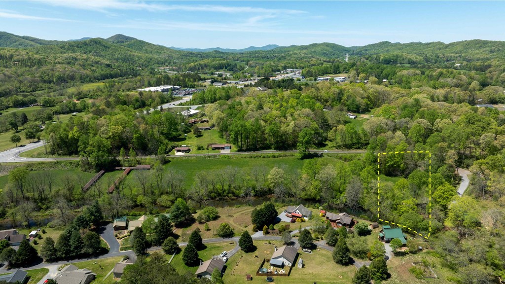 981 Myers Chapel Road Hayesville, NC 28904 - Photo 12 of 44 an aerial view of residential houses with outdoor space and trees