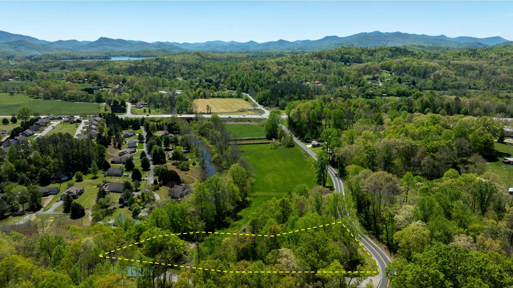 981 Myers Chapel Road Hayesville, NC 28904 - Photo 15 of 44 a view of a lush green hillside and houses