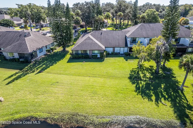 a view of a house with a garden