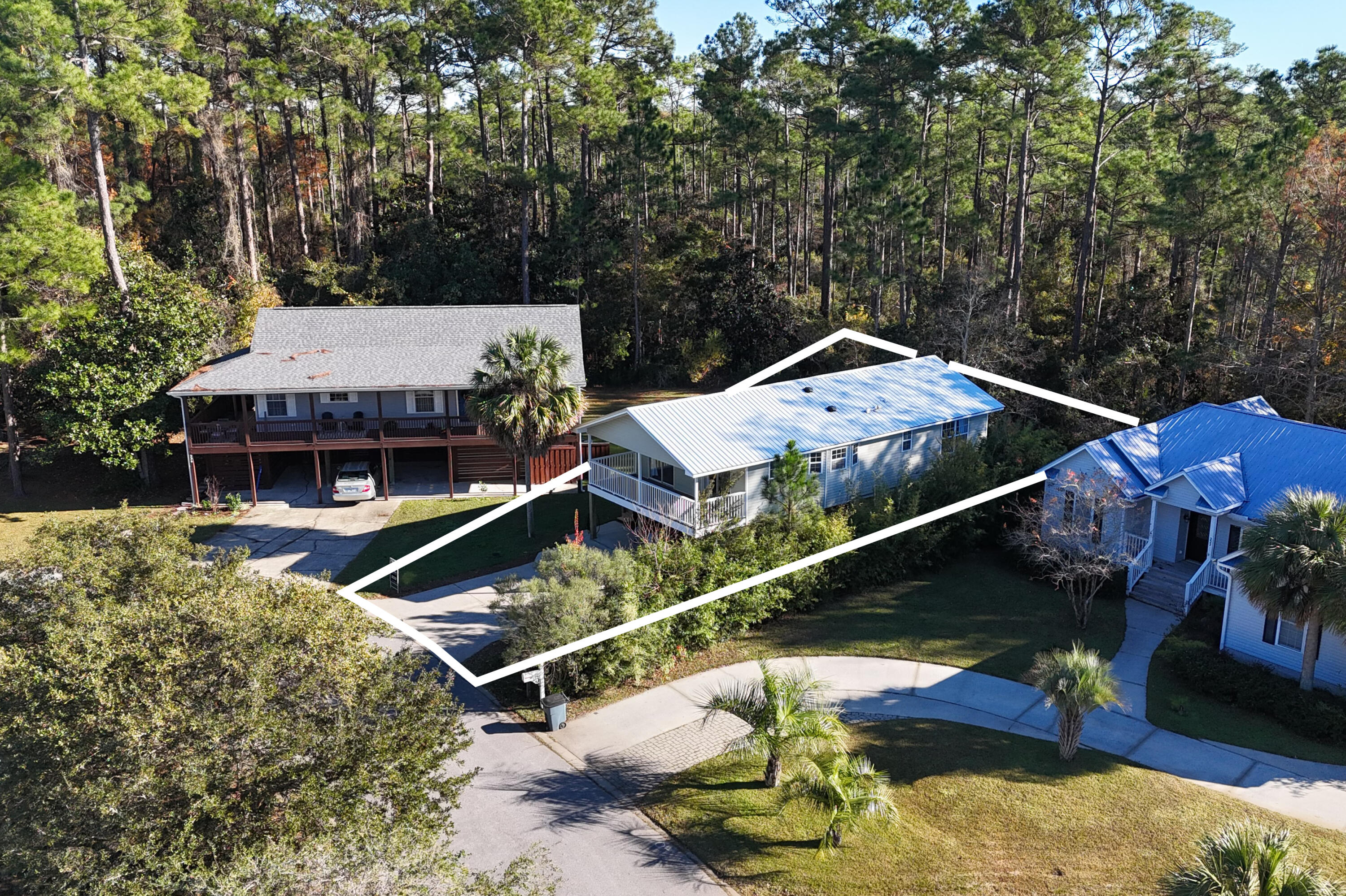 230 Plantation Way Santa Rosa Beach, FL 32459 - Photo 28 of 29 a view of a house with swimming pool and sitting area