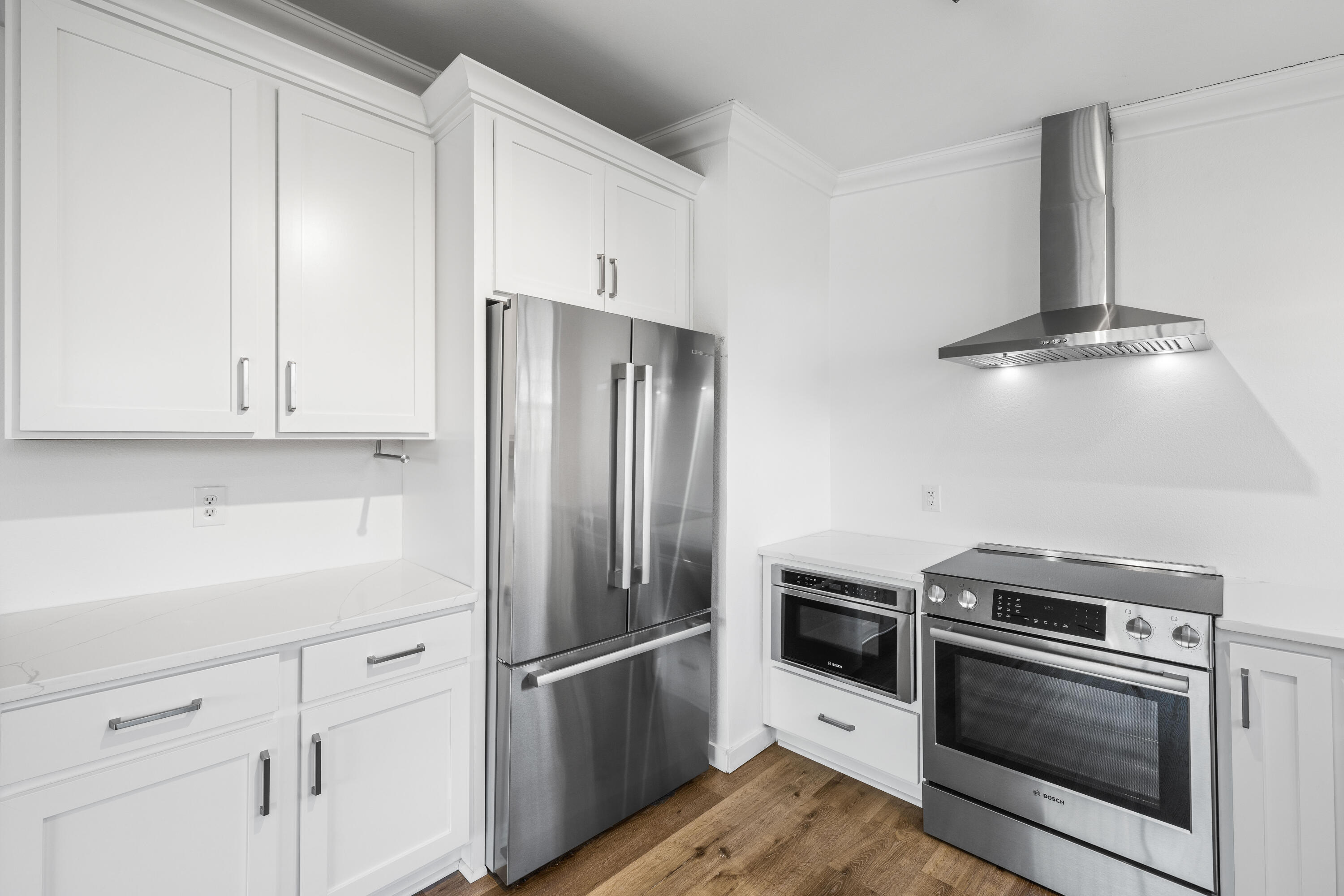 230 Plantation Way Santa Rosa Beach, FL 32459 - Photo 8 of 29 a kitchen with cabinets and stainless steel appliances