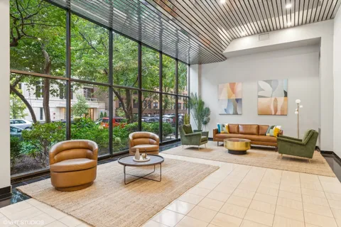 a outdoor space with patio the couch and chandelier