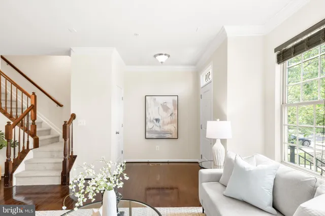 a kitchen with granite countertop a stove top oven microwave and cabinets