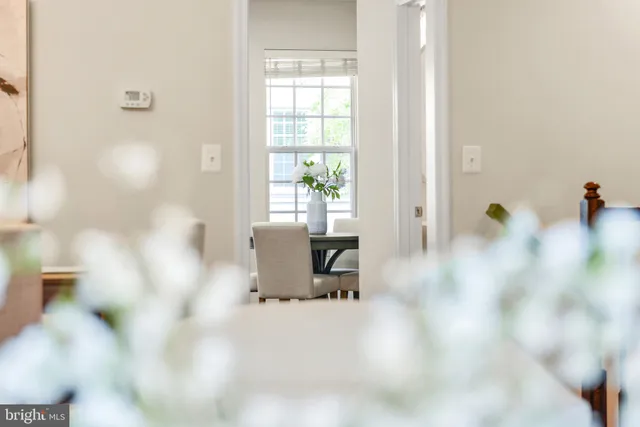 a kitchen with stainless steel appliances granite countertop a stove a refrigerator and a sink