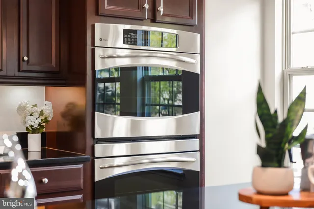 a view of a white bath tub and a sink