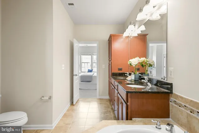 a view of a livingroom with furniture and windows