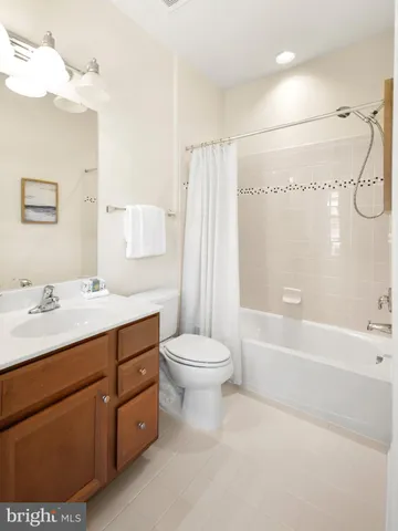 a sign board on the side of a street