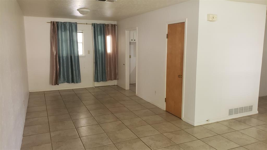 a view of a hallway with closet area