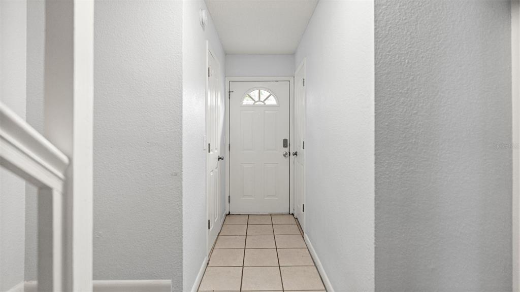 501 Southwest 75th Street, Unit B5 Gainesville, FL 32607 - Photo 3 of 38 a view of a hallway view with wooden floor