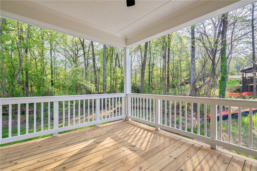 1709 Eastside Parc Street Atlanta, GA 30316 - Photo 33 of 38 a view of balcony with wooden floor and fence