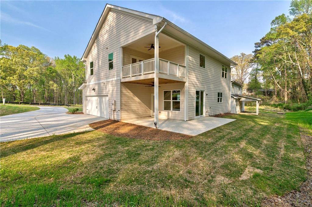 1709 Eastside Parc Street Atlanta, GA 30316 - Photo 35 of 38 a view of a house with backyard and trees