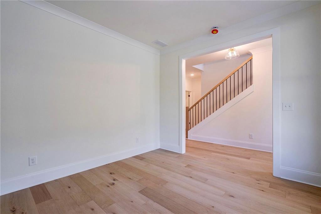1709 Eastside Parc Street Atlanta, GA 30316 - Photo 7 of 38 a view of an entryway with wooden floor