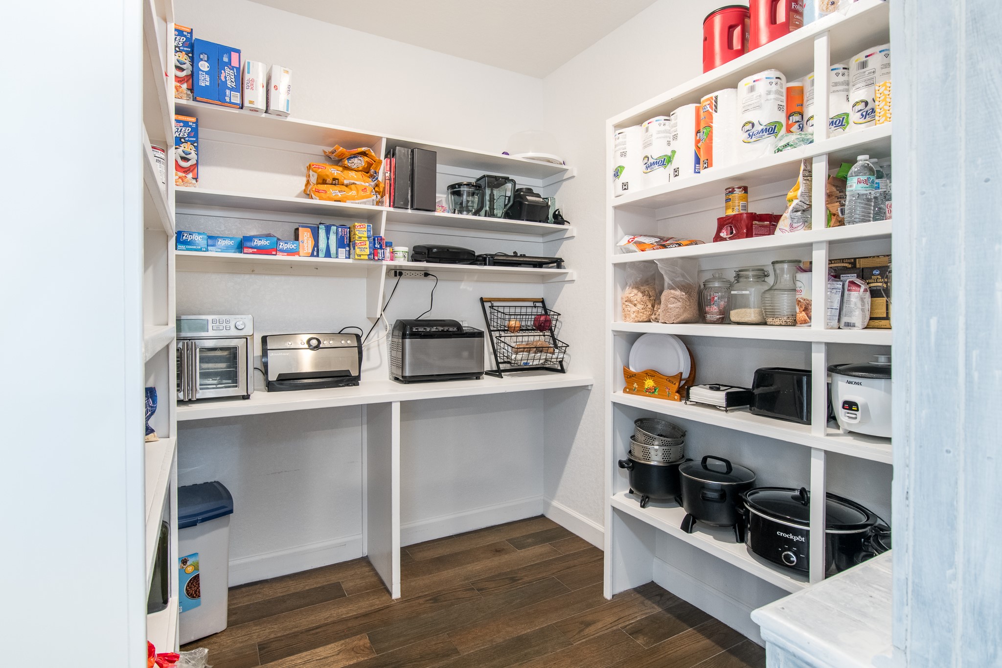1 Greystone Court Angleton, TX 77515 - Photo 19 of 28 Huge walk in pantry with shelving throughout