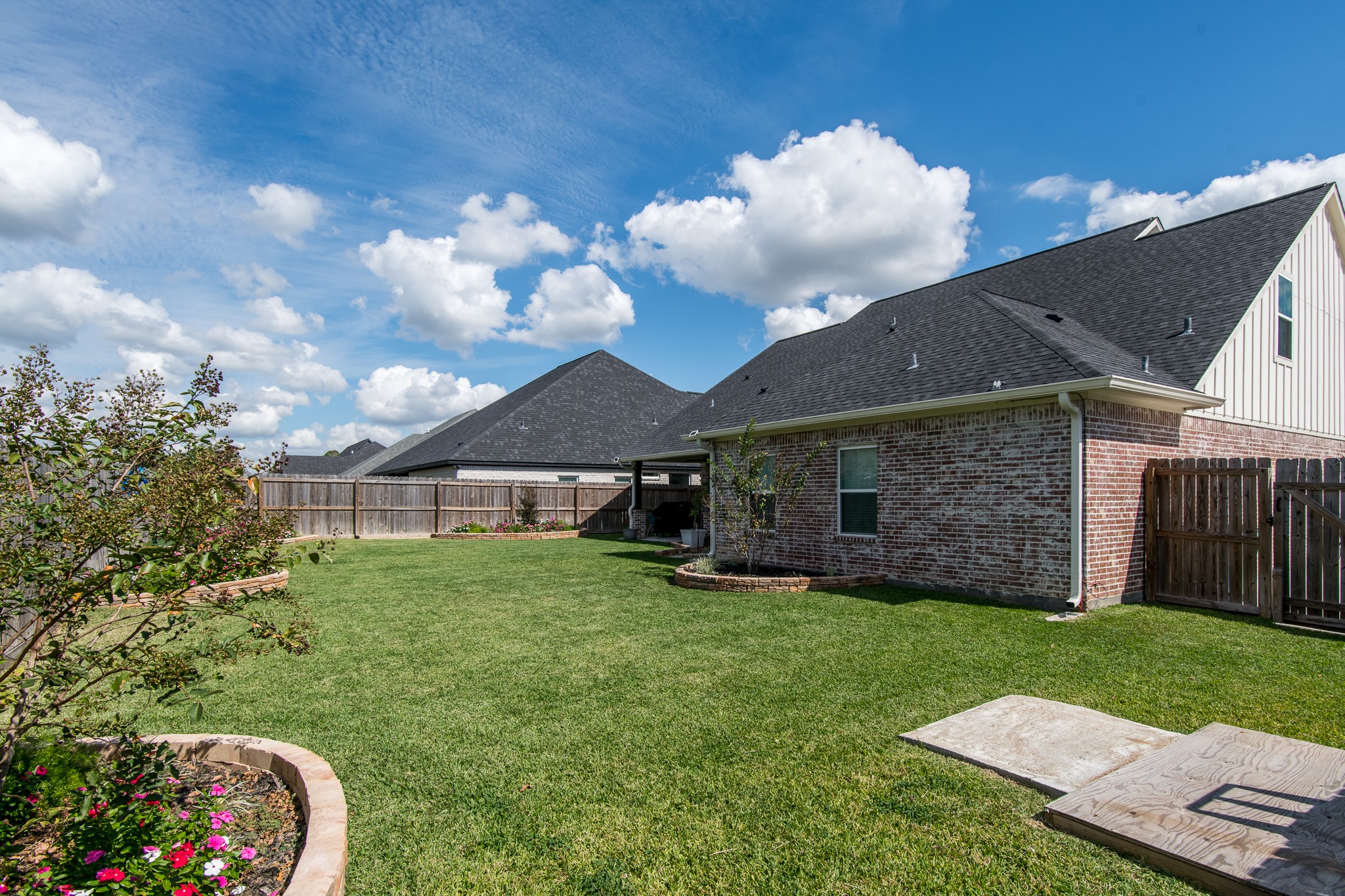 1 Greystone Court Angleton, TX 77515 - Photo 22 of 28 Huge backyard area great for entertaining, adding a pool, or just to enjoy the gorgeous landscaping