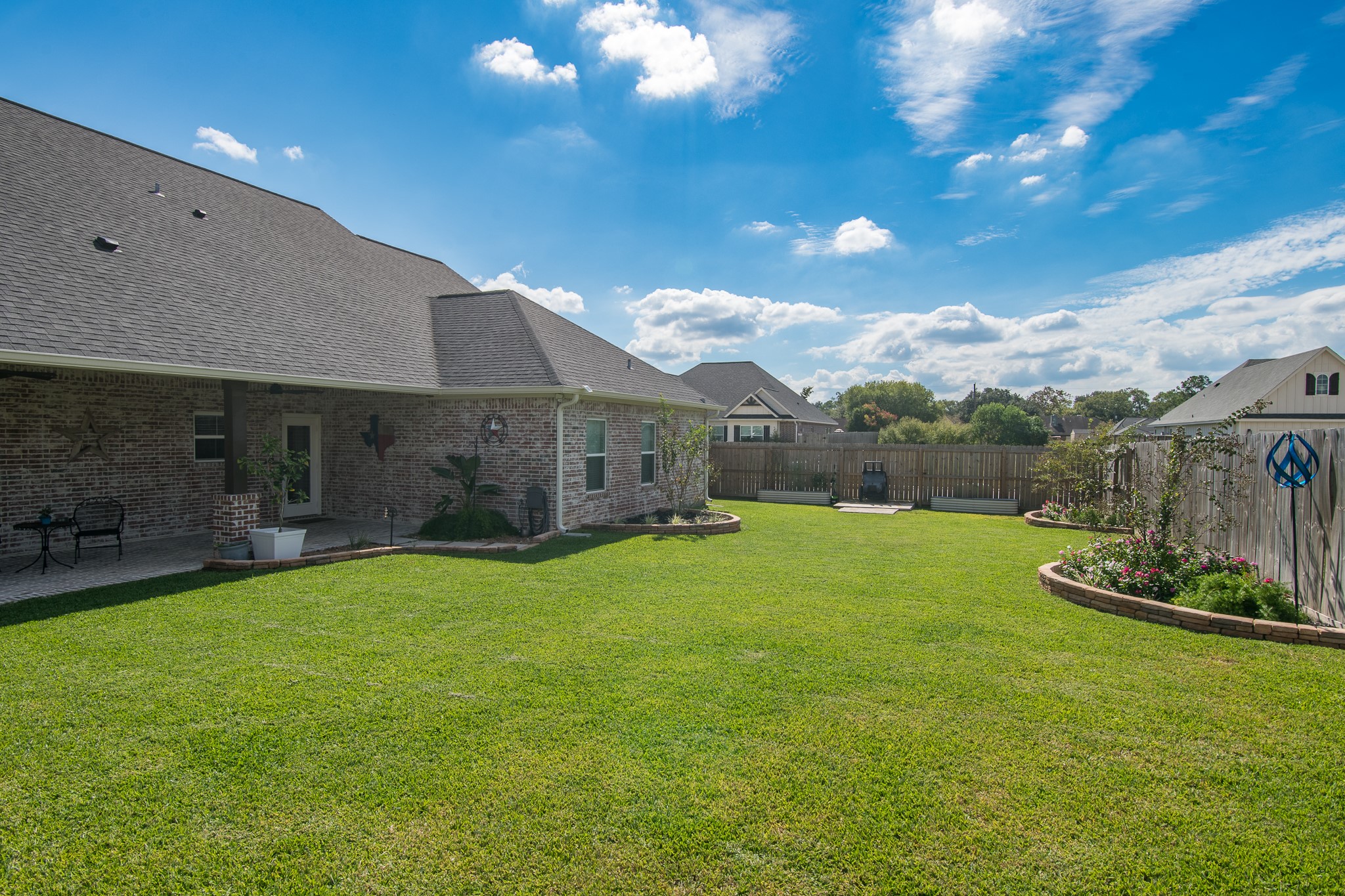 1 Greystone Court Angleton, TX 77515 - Photo 24 of 28 Huge backyard area great for entertaining, adding a pool, or just to enjoy the gorgeous landscaping