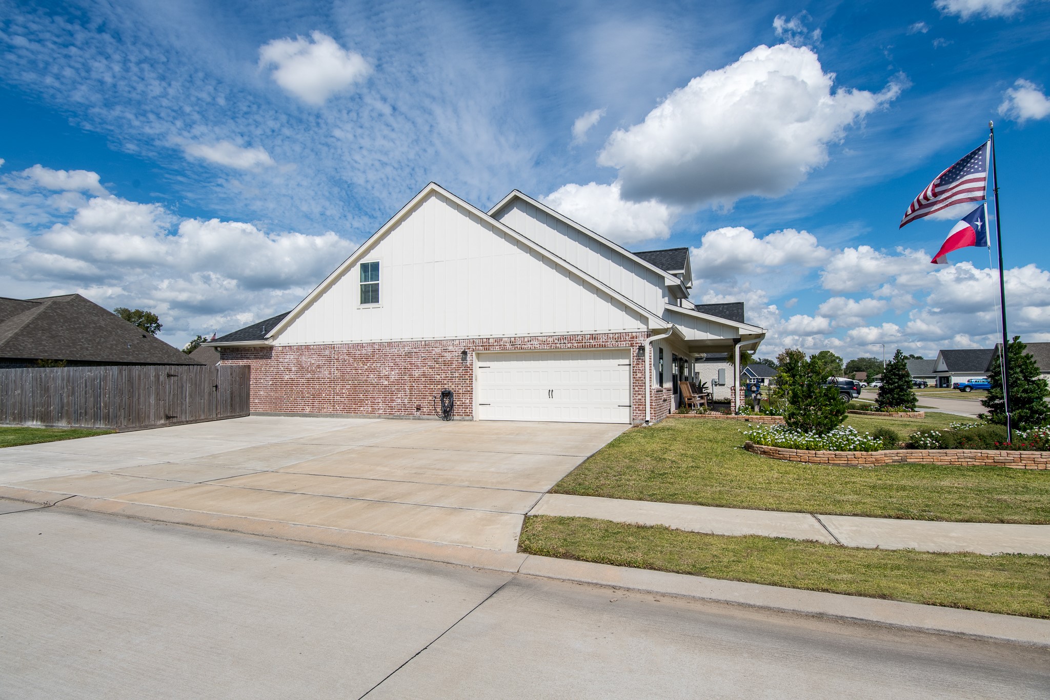 1 Greystone Court Angleton, TX 77515 - Photo 26 of 28 Side garage with extended driveway which allows for 3 more parking spaces