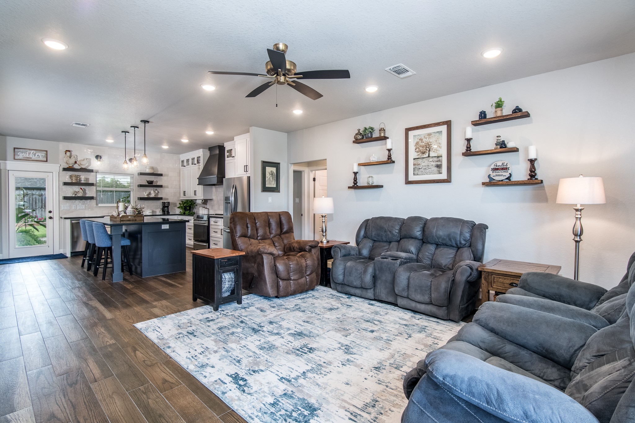 1 Greystone Court Angleton, TX 77515 - Photo 5 of 28 Open living room and kitchen combo