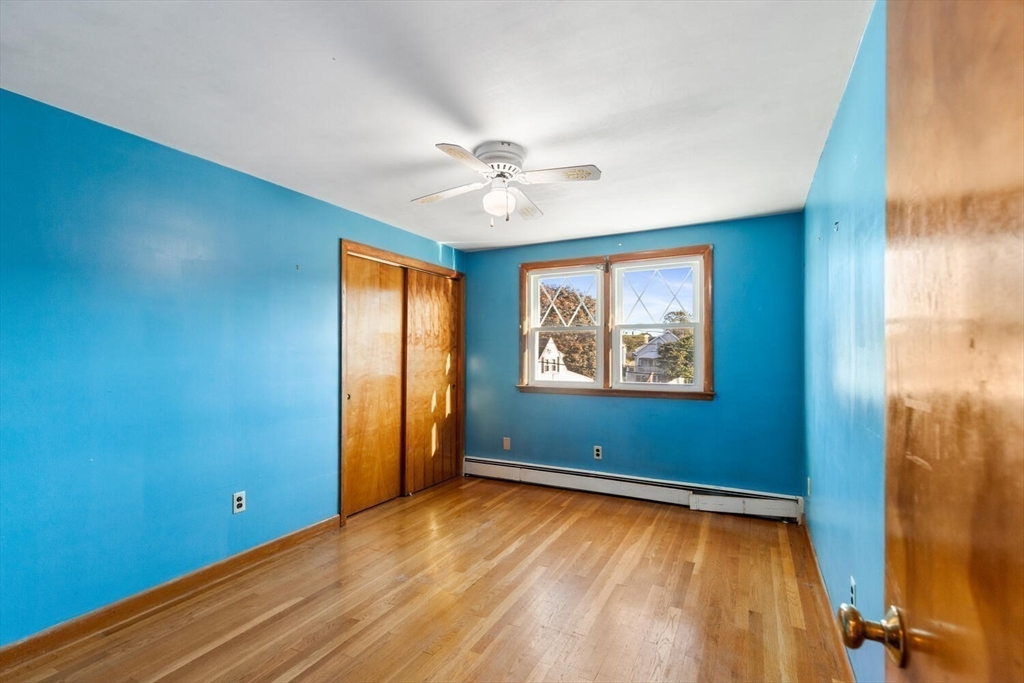 10 Horton Street Salem, MA 01970 - Photo 16 of 26 an empty room with windows and fan