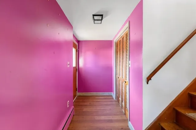 a view of a livingroom with stairs