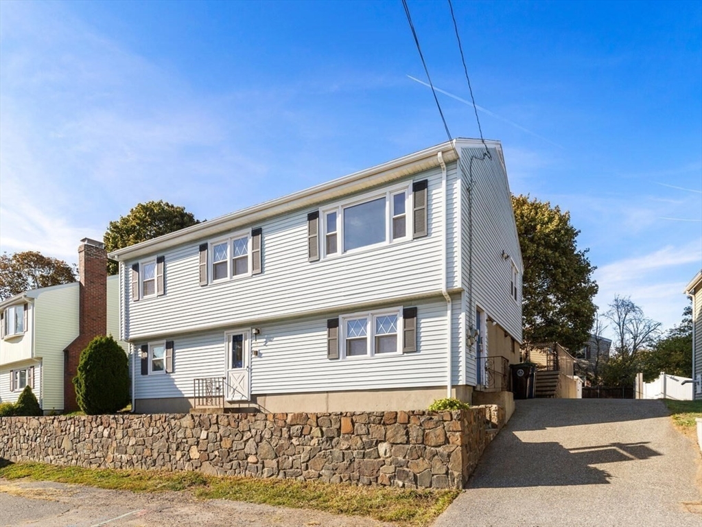 10 Horton Street Salem, MA 01970 - Photo 2 of 26 a front view of a house with a yard