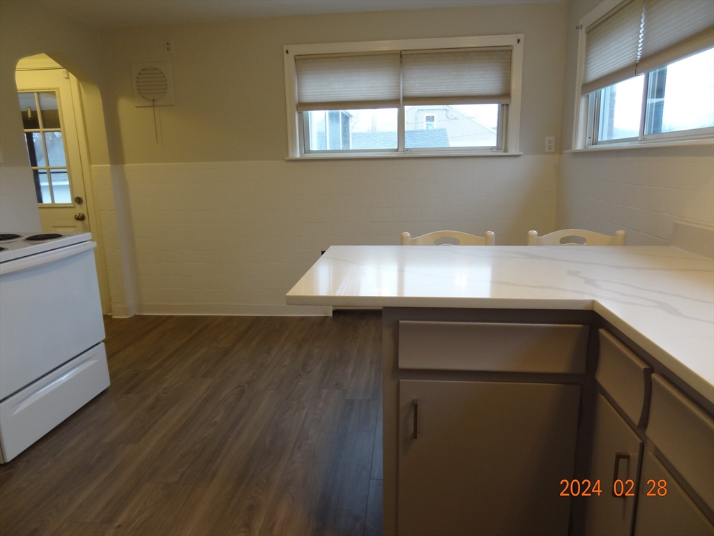 131 Worcester-Providence Turnpike, Unit 1 Millbury, MA 01527 - Photo 15 of 18 a room with closet and window